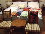 King bed with mission headboard. Pair of victorian chairs