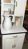 Nice all enamel kitchen cabinet. Probably 1930s.