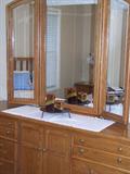 Bassett dresser with triple adjustable mirror.