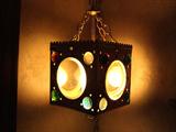 Unusual brass lamp with glass jewels.