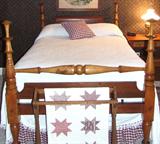 Fine cherry rope bed with quality foundations.
