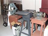 Band saw, table saw and grinder. Other small hand power tools also.