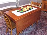 Super cherry dropleaf. Six old arrow backs compliment this table nicely.