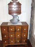 Nice 12 drawer apothecary cabinet. Cherry three wall hung cabinet with drawers.