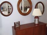 Old walnut Victorian mirrors and newer three door cabinet.