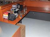 Nice corner office desk with matching reception desk.