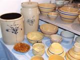 Lots of old cobalt decor crocks, jugs & a large churn plus many, many yellow ware bowls and more.