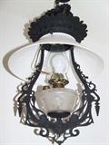 Cast iron Victorian kitchen lamp with old shade.