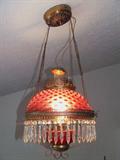 Great cranberry hanging light with pull down hardware.
