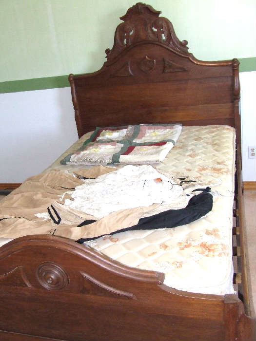 Victorian walnut fancy carved bed.