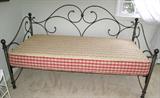 Wrought iron daybed.