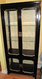 Oriental style china cabinet.