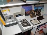 Kodak EasyShare with printer dock. Kobo ereader plus some office supplies.