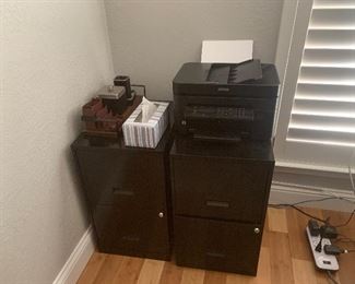 Lots of file cabinets throughout the house. Wood and metal 