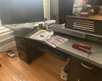 Interesting desk made from a door w files and pullout keyboard drawer