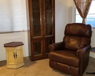Shabby chic side table
22" tall x 18" diameter 
Leather recliner 
1970s bookcases
72" tall 
29" wide 
15" deep 