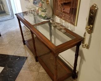 Vintage entry table/ sofa table with cane accent on bottom
52" long x 16" deep x 28" tall 