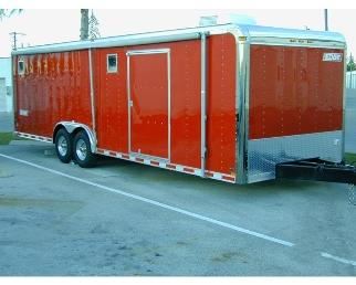 2000 HAULMARK EDGE 28 ft. Tag axle car hauler trailer. Ac/heat. Roll out awning. Generator compartment. Diamond plate floor and drop down loading door with low clearance loading ramps . Built in cabinets. Wench. Metal floor hooks for tie downs. Excellent condition. Garage kept. Very little use!