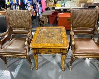 Ornate executive armed conversation chairs brown leather with with rattan backs . Ornate  legs and arm rest.      Lamp table with fanned woodwork top with beveled glass top one drawer