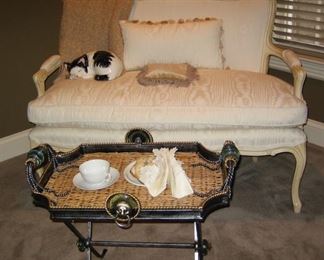 Boudoir sattee . Ivory fabric with ivory ornate solid wood frame . DIMENSION: 47” w x 26 “ deep with 19 “ seat height and 39 1/2  back height.          Folding wrought iron in brushed metallic with turquoise jeweled embellishments and lion head medallion. Removable wicker based tray measures 26” x17” x20”