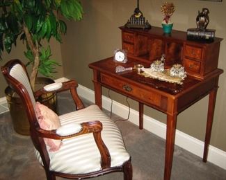 Beautiful letter desk with removable top with small storage drawers and letter slots.main desk has on drawer. Ornate wood frame chair with silk pin striped fabric. Offered together as individually.