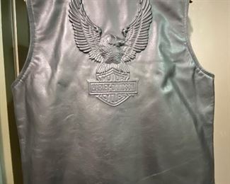 Harley Davidson Black LeatherVest with embossed eagle and Harley emblem on back  Men’s Lg. More Harley clothing available. NEW 