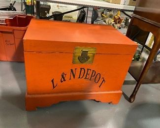 L & N Depot Wooden trunk. Great for a toy box, linen storage or record collection . Latch handle with slick for padlock . 18” x 28” x 22” high
