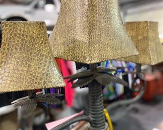 Floor lamp with three lights. Leopard shades palm tree pole and wicket look suitcase base.