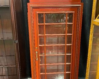 British Phone Booth Curio with four glass shelves. Solid wood. Red. DIMENSIONS: 28” w X 16 “ deep x 72” high.