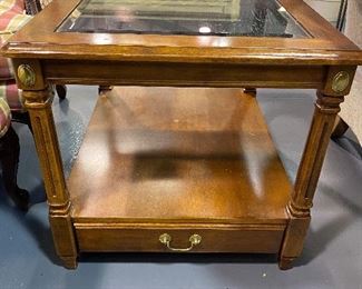 Cherry end table/Nightstand. Bottom shelf  with one drawer. Beveled glass top 