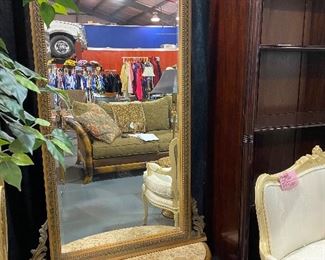 Antique Foyer mirror with base. Ornate woodwook. Marble base. Beautiful piece! Overall dimensions 84 1/2 “high x 40” wide. Base is 14” deep
