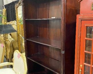 Mahogany bookshelf with column trim on sides four shelves and two bottom drawers. 78” x 44” x16”