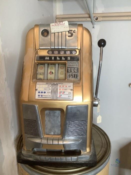 Mills Nickel Slot Machine
Mills Slot Machine for nickels. Circa 1935. According to owner works perfectly & valued at $1600. Key included. H27" x W16" x D16"