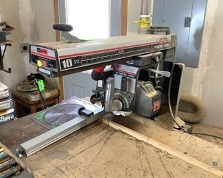 Craftsman Radial Arm Saw & Vacuum System
Craftsman Radial Arm Saw 10" blade & vacuum system also made by Craftsman. Model No. 113.19770. Powers on. Includes two (2) 10" blades. Vacuum system comes with extra tube pieces. Most of vacuum system must be removed from walls and ceiling.
