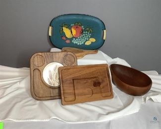 Serving Trays & Teak Wood Bowl
Six (6) items: serving trays including wood & plastic, handcrafted Teak wood bowl, two (2) small wood cutting boards, one (1) wood cutting board with handles. See pictures.