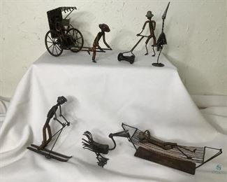 Metal Art by Leo
Several unique metal art items, most signed by artist, Leo. Includes man mowing, sea birds, man skiing, man in hammock and man pulling a cart.
