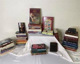 Bibles and Inspirational Books
Many different bibles! One is the Sunday School Scholar's bible, another is the 1599 Geneva Bible in its original box. Several books of inspiration that are too numerous to list.