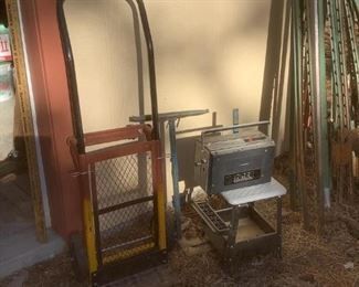 Hand Trucks & More
One (1) metal multi-use hand truck, W14" x D24". One (1) metal hand truck, W14" x D5" (appears homemade). Vintage Panasonic radio/cassette player (unknown working condition. Hirsh plastic/metal seat, H14" x W13" x D10". Used condition.