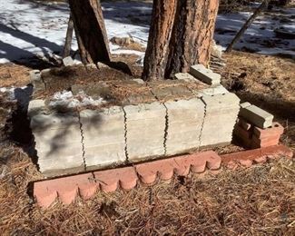 Concrete Decorative Edging Bricks
Numerous concrete edging bricks of various design (scallops approximate measurements, H4" x W11.5" x D2.25" & round top approximate measurements, H12" x W4" x D4"). Approximately eight (8) red edging bricks approximate measurements, H6" x W24" & W10" x D 2". Approximately eight (8) red bricks (with 3 holes) approximate measurements, H3.5" x W8" x D2.5".