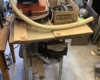 Table Saw on Homemade Utility Cart
Unknown mfg. table saw (label worn off) appears to use 10" blade. Includes box of small vices & miscellaneous parts & one (1) sheet of glass (new in cardboard cover). W21" x D11.5" Montgomery Ward floor model vacuum cleaner (unknown working condition).