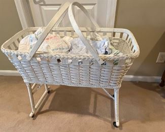 Older White Wicker Bassinet and Crib Bedding