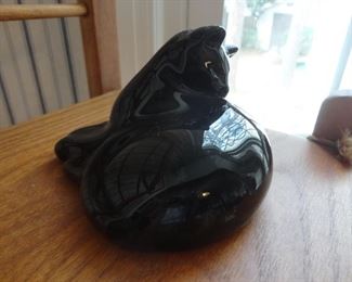 Baccarat Grooming Black Cat