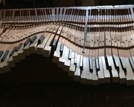 ANTIQUE PIANO KEY BOARD CUSTOM MADE BY THE HOME OWNER.   ONE OF A KIND.   MAY LOOK GOOD A  BAR ON JEFFERSON AVE..?????? 