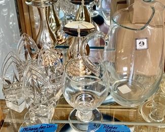 3 Taper Mikasa Art Deco Candle Holders $8ea
New Pitcher with 4 Pedestal glasses $18
