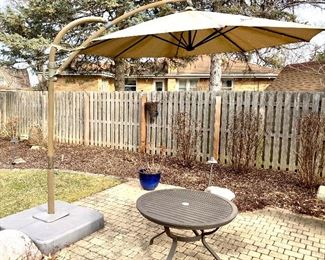 Crate & Barrel Outdoor Aluminum low patio table $50 sold
11’ Round sand based Outdoor patio Umbrella with twinkle lights $148 pending