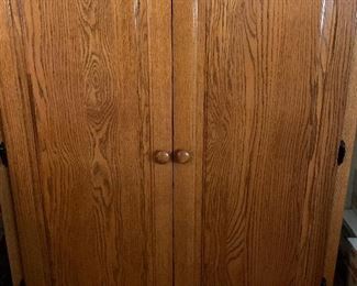 Solid Oak storage cabinet with shelves
