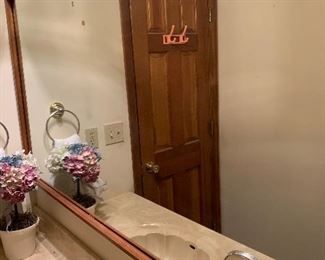 Large mirror in Powder room