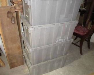 4 Stackable Gray totes.