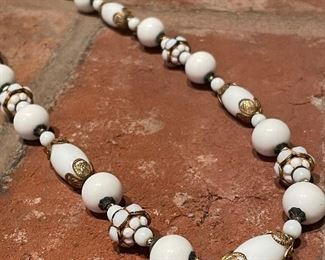 $8; white and gold beaded necklace