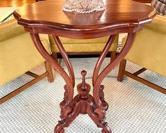 SOLD        $300; Victorian side table with ornate carvings in base; 24”w x 20”d x 30”h